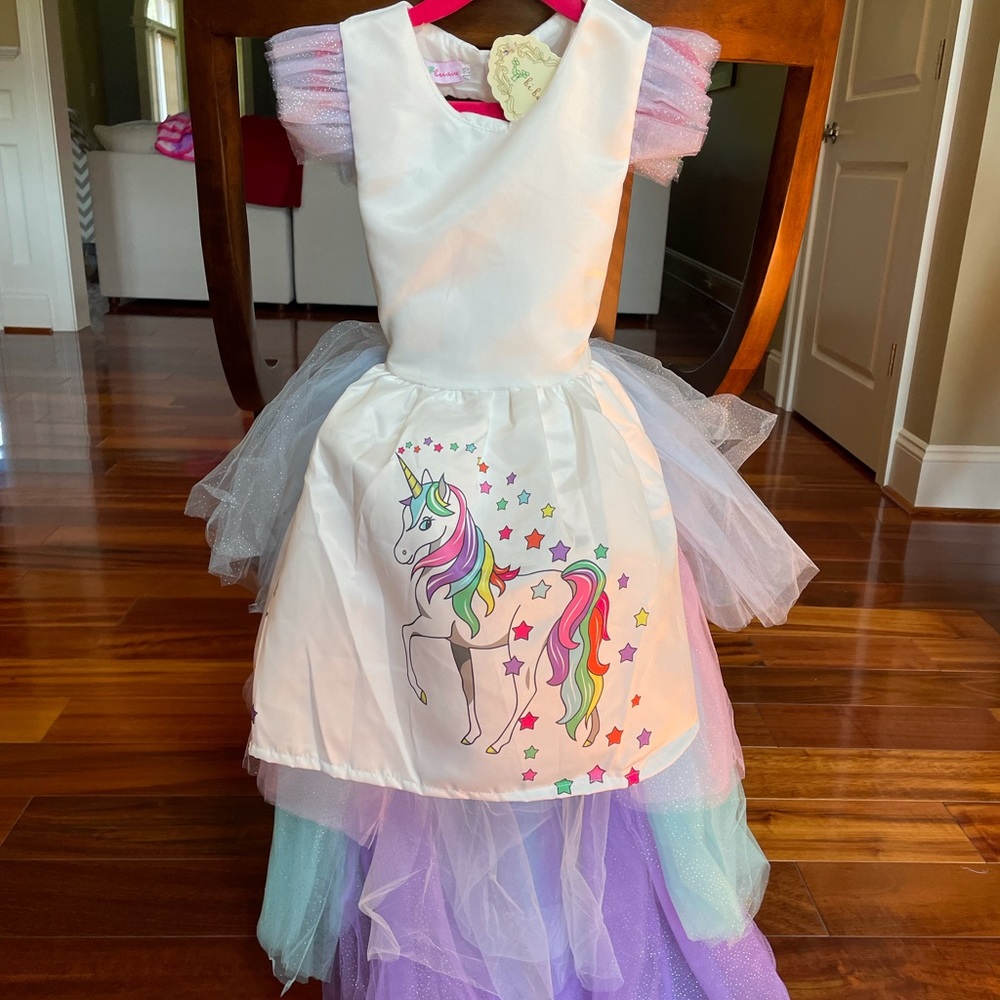 Unicorn dress with open back and detachable train